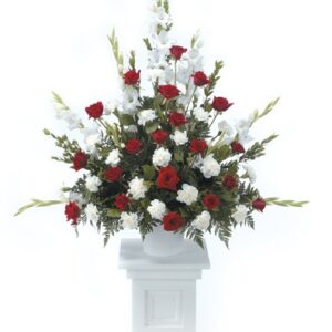 Large arrangement of Roses, Carnations and Gladiolus.