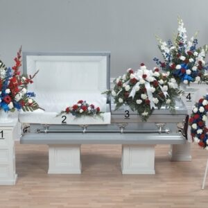 Honor Tribute with red, white and blue flowers features striking blue delphinium