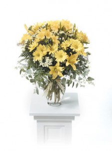 Vase of yellow and white Flowers on a pedestal