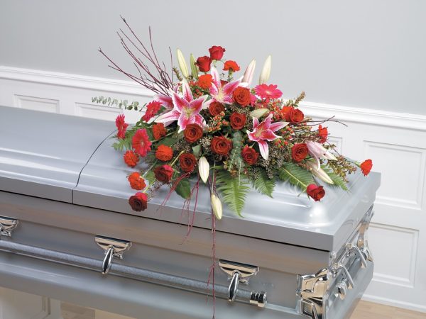 Purity and Innocence Stargazer Casket Spray