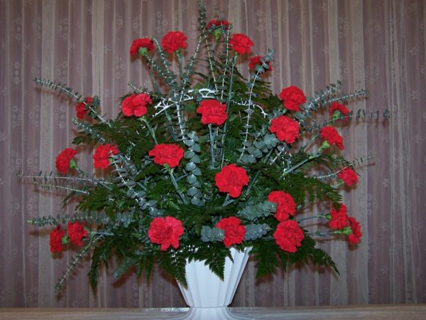 two dozen Red Carnations Basket